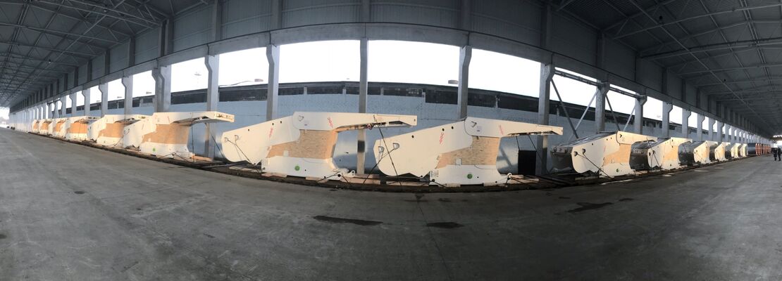 panorama: shield supports on railroad flatcars